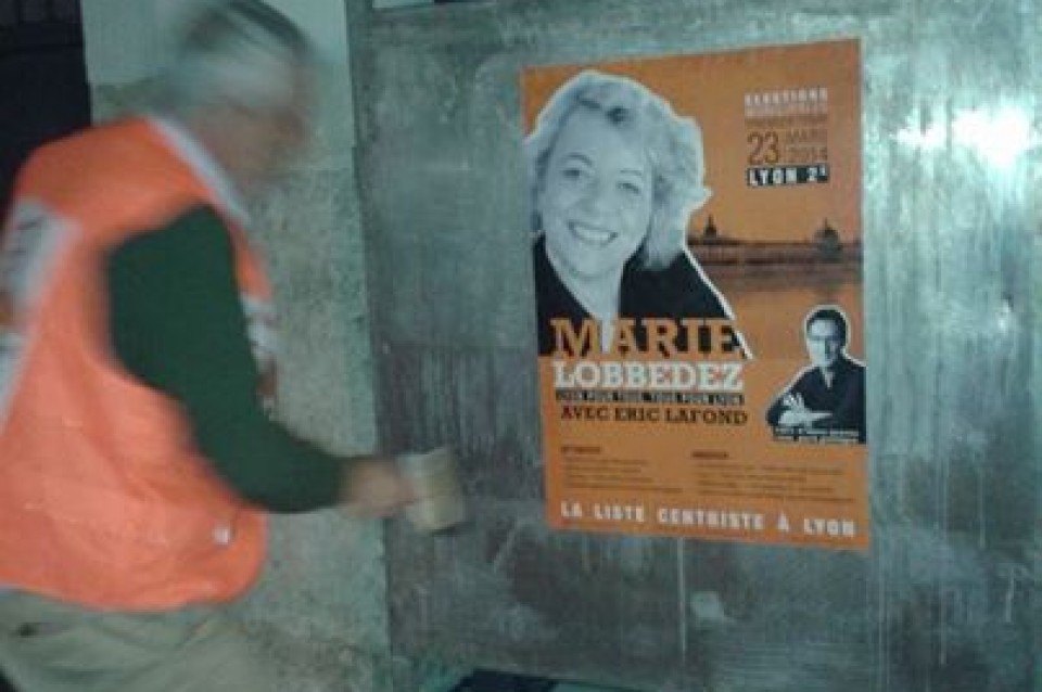 Collage d’affiches le 10 mars 2014 